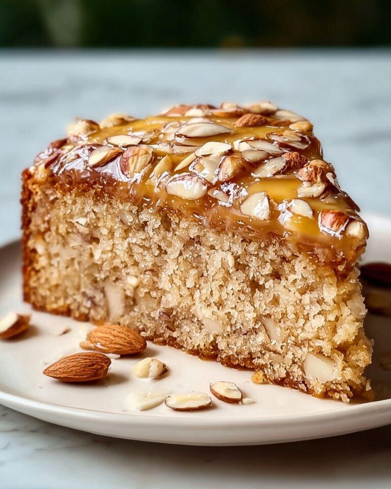 Almond Cake with Sliced Almond Topping and Vanilla-Bean Cream Recipe
